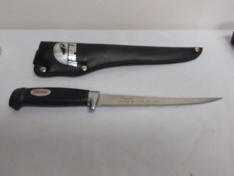 lot 479 image: Rapala Knife 7.5-inch Blade, Rubber Handle and case, Hand Ground Stainless