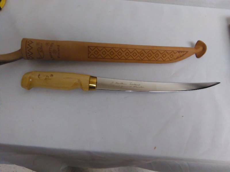 lot 482 image: Rapala 6 in. Blade, Wood Handle with leather case Rapala 9 in. Blade, Wood Handle with leather case, Hand Ground Stainless