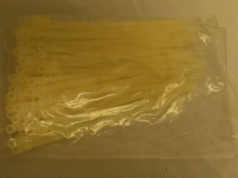 lot 571 image: 8-Inch Zip  Cable Ties (100 ct.) White