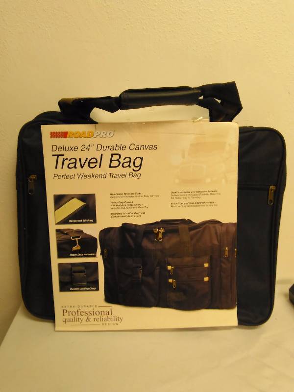 lot 591 image: 24 Inch Durable Canvas Travel Bag, Road Pro
