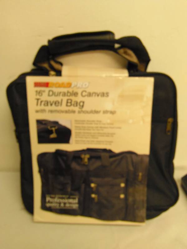 lot 592 image: 16 Inch Durable Canvas Travel Bag, Road Pro