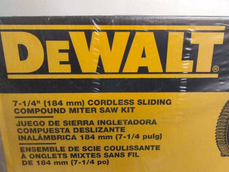 lot 151 image: DeWalt 7  Cordless Sliding Compound Miter Saw Kit Model No. DCS 361M1