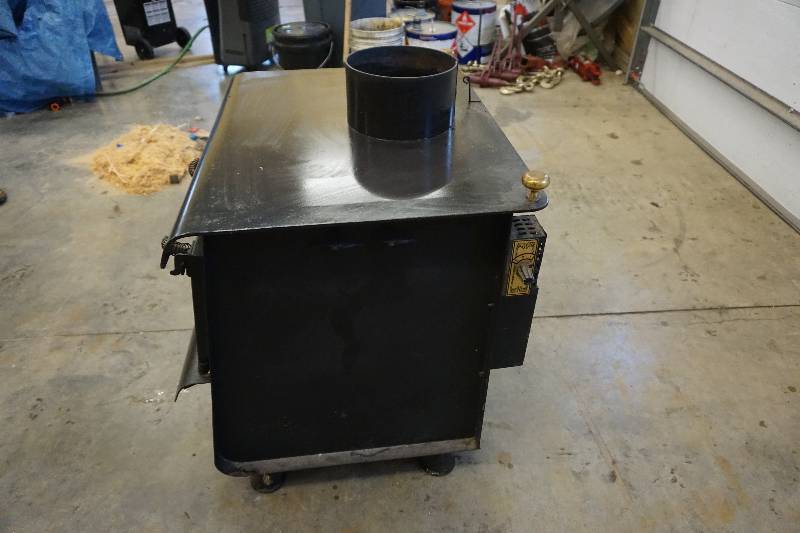 lot 20 image: The Earth Stove Heavy Duty Wood Burning StoveFurnace