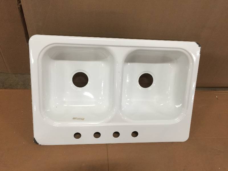 lot 33 image: Bootz Industries Garnet II Top Mount Porcelain 22 in. 4-Hole Self Rimming Double Bowl Kitchen Sink in White damaged edge see pictures Model 031-2958-OK