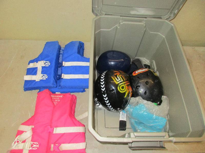 tote w 2 kids life jackets and 3 helmets