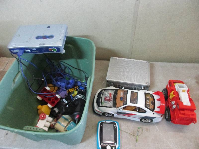 tote of kids toys - leap pad 2 and vtech vflash