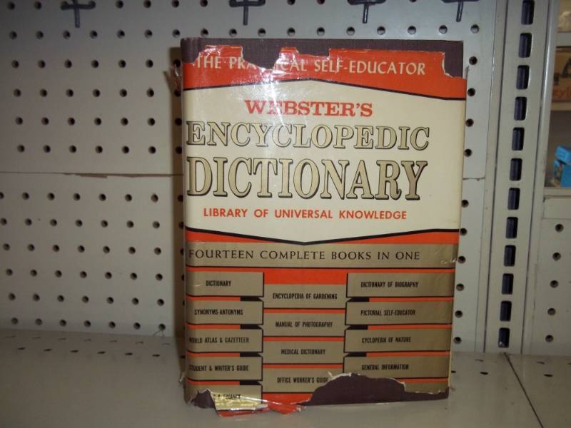 lot 95 image: Vintage Websters Dictionary