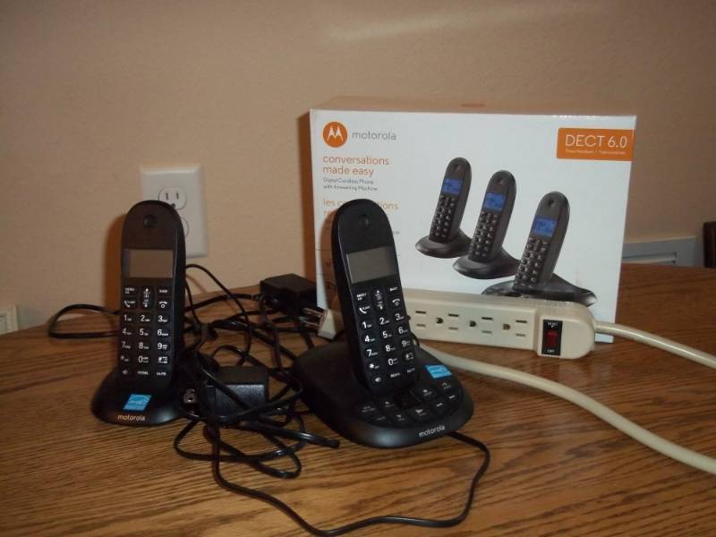 lot 24 image: Cordless Phones and power bar