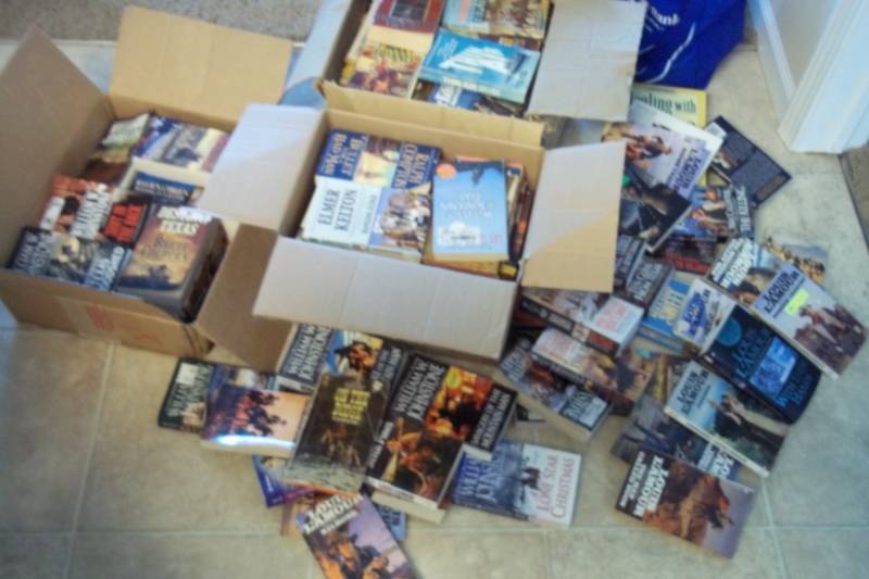 lot 122 image: Large Lot of Western Books soft covers