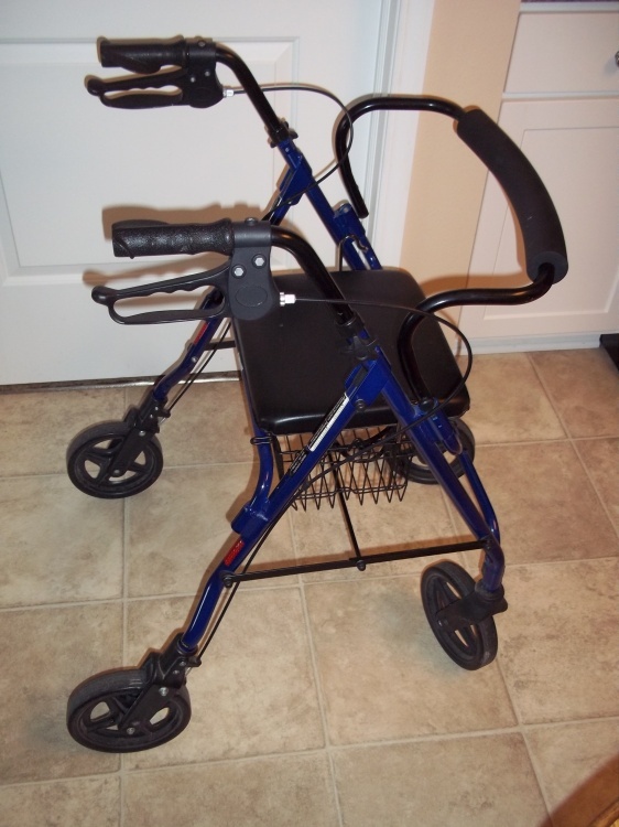 lot 129 image: Rolling Walker with seat and  basket