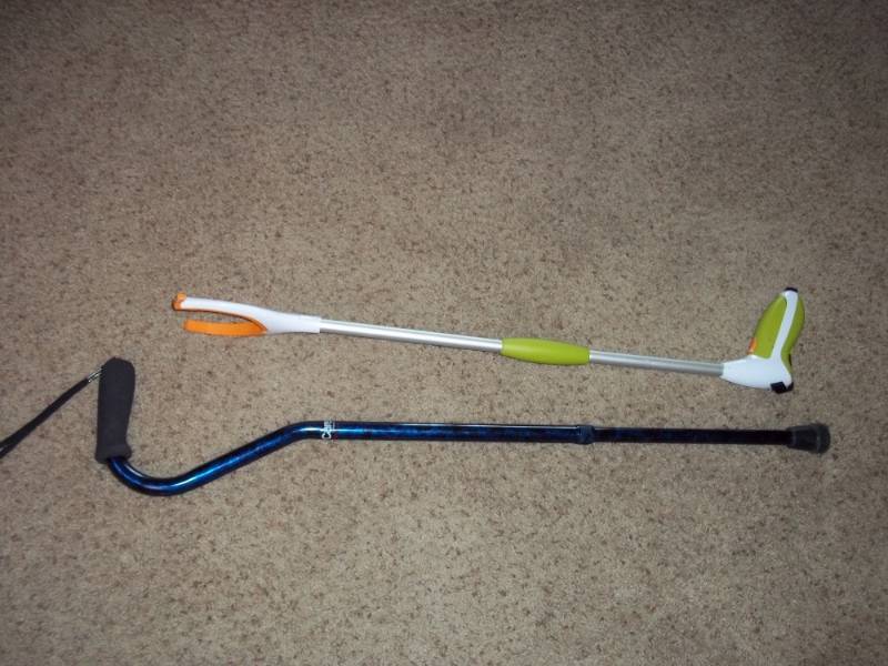 lot 130 image: Cane and Grabber