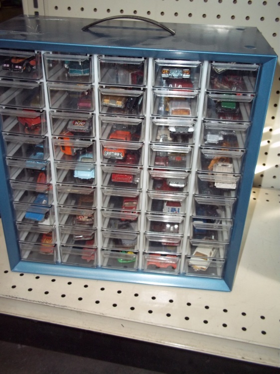 lot 120 image: Parts bin full of vintage matchbox cars