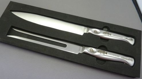 25 Carving knife and fork sets...