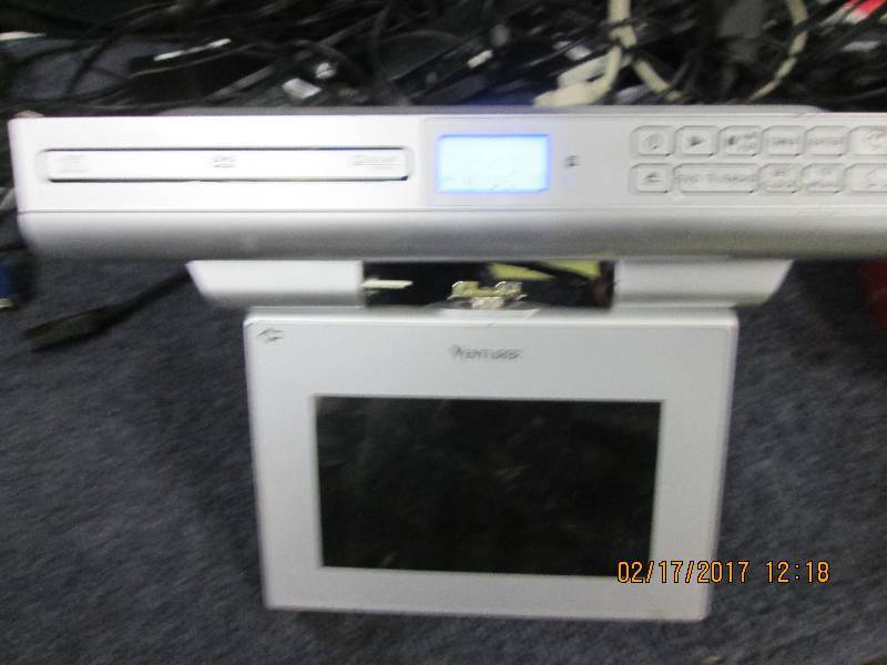 lot 25 image: undercounter dvd,radio and tv raido...
