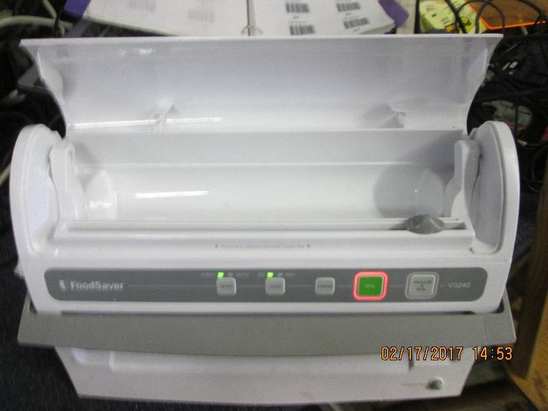 lot 57 image: FoodSaver powers on...