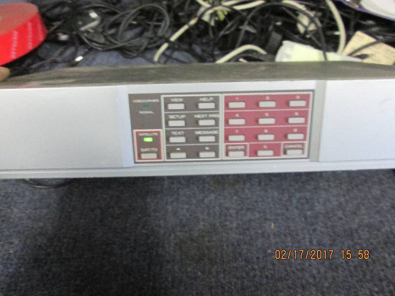 lot 73 image: MA COM Video Cipher Powers on...