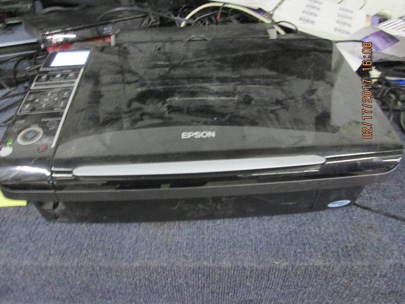 lot 76 image: Epson stylus 400 printer, powers on...