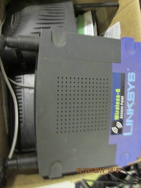 lot 112 image: lot of wifi routers and modems and ...