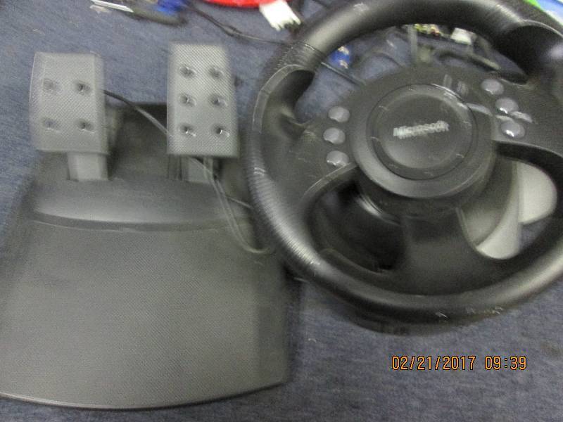 lot 128 image: microsoft steering wheel and gas pe...