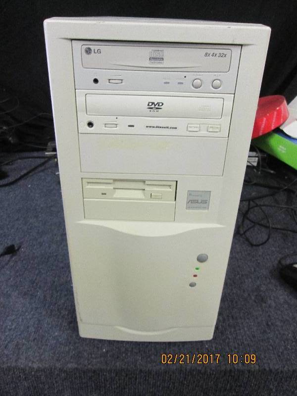 lot 137 image: computer tower powered by asus boot...