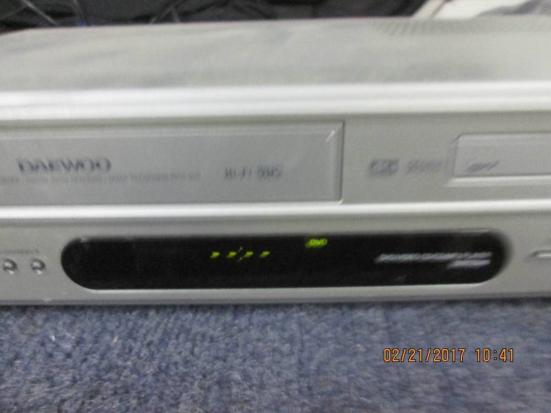 lot 144 image: daewoo vhsdvd player powers on ...