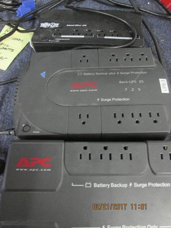 lot 150 image: 2 apc battery back up and surge pro...