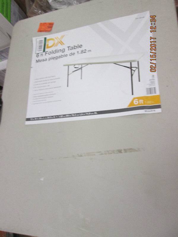 lot 86 image: 6 ft HDX folding table...