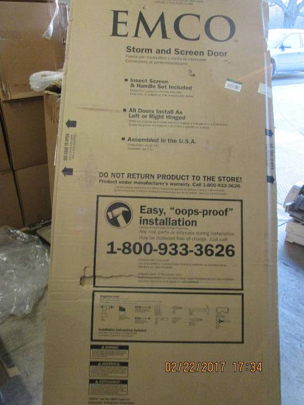 lot 170 image: 36x80 screen and storm door damag...