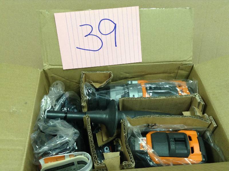 lot 39 image: RIDGID 18-Volt Lithium-Ion Cordless Hammer DrillDriver and Impact Driver Combo Kit Model#  R9624  open box never used