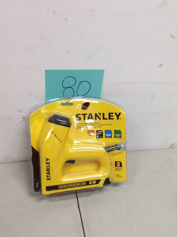 lot 80 image: Stanley 2-in-1 Electric Stapler and Strip Brad Nailer Model#  TRE550Z 