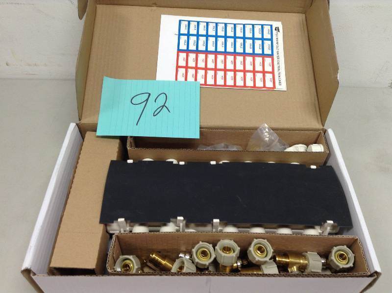 lot 92 image: Apollo 12 Port PEX Manifold with Valves Model # 6907912CP New