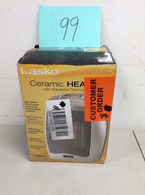 lot 99 image: Lasko 9.2 in. 1500-Watt Electric Portable Ceramic Compact Heater open box never used