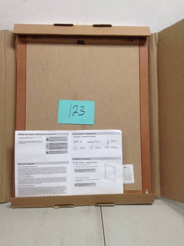 lot 133 image: Glacier Bay Chelsea 28 in. x 22 in Framed Wall Mirror in Nutmeg open box never used