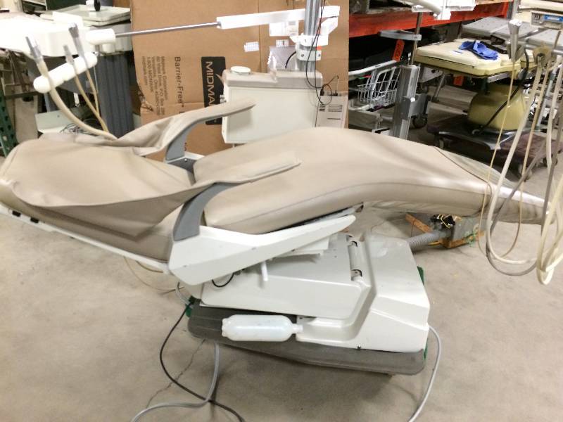 lot 83 image: WOWOW RetailS Used $8000 Recently Removed & Was In Working Order - Chair Lift Tilt Tested Operational While Taking Pics Adec Power Dental Chair With Overhead Light And All Attachments AMAZING