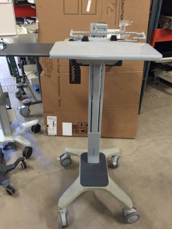 lot 36 image: Retails Used $600 Ergotron Sit Stand Height Adjustible Mobile PC Desktop Computer & Monitor Workstation Cart Portable Desk W Extra Slide Out Table Mousepad & STorage Locking Wheels - I want one