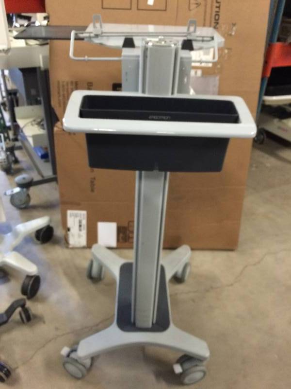 lot 38 image: Retails Used $600 Ergotron Sit Stand Height Adjustible Mobile PC Desktop Computer & Monitor Workstation Cart Portable Desk W Extra Slide Out Table Mousepad & STorage Locking Wheels - I want one