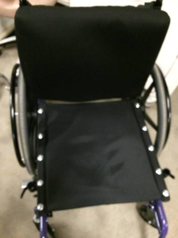 lot 69 image: Retails New $500 Invacare 9000 SL Wheelchair Collapsible Adjustable Back Height Purple Accents Arms Have Been Removed - Nice Condition