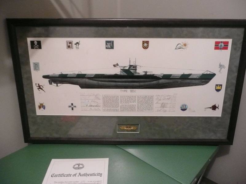 lot 9 image: TYPE Vll C - Top 10 U boat German Famous Boats - #282 of 800 -  Signed By Crew - Approx 35 by 20 - Professionally Framed