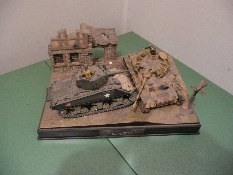 lot 58 image: American Sherman Tank & Mark 4 German Tank Display