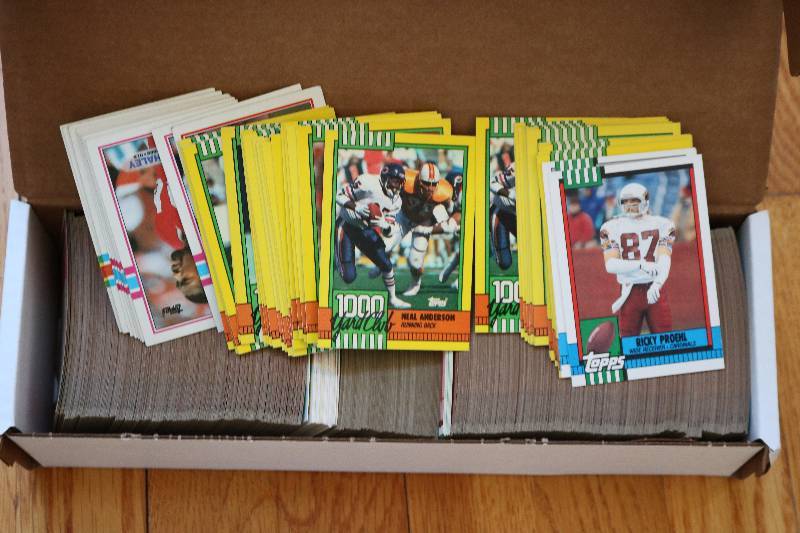 Box of 1990 Topps Football cards...