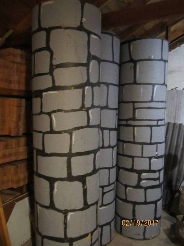 3 cement forms painted like brick p...