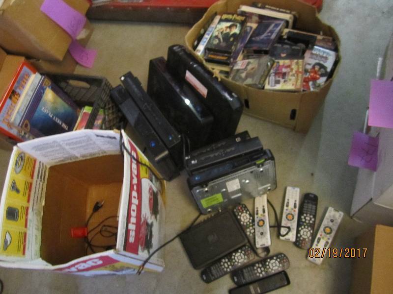 Lot of cable receiver boxes and mov...