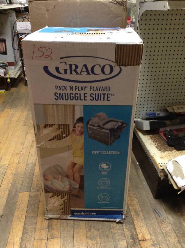 Graco Pack and Play Snuggle Suite Never used