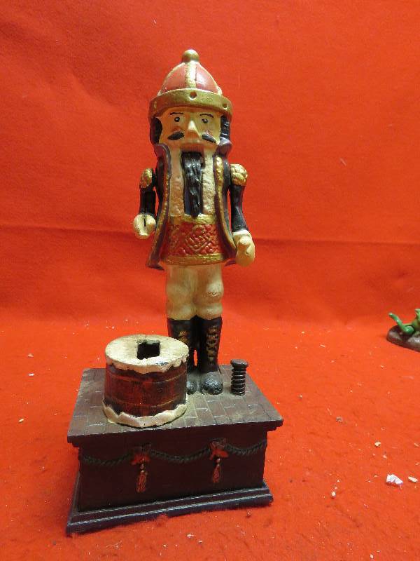 lot 231 image: NUT CRACKER CAST IRON MECHANICAL BANK
