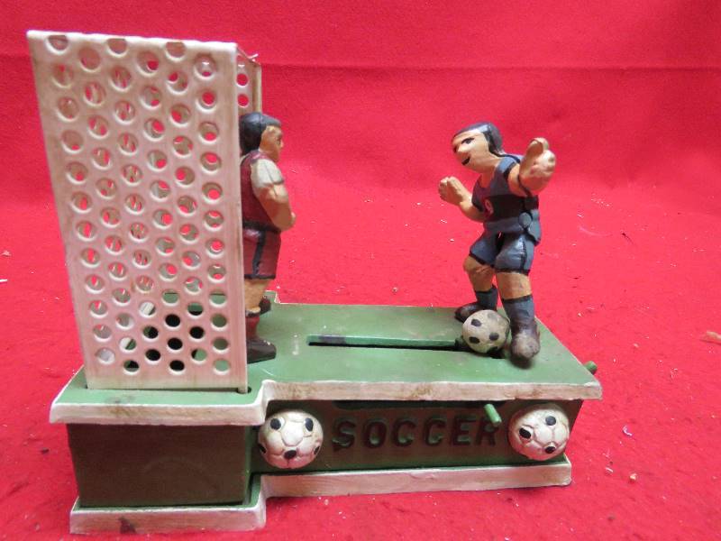 lot 234 image: Soccer Cast Iron Mechanical Bank