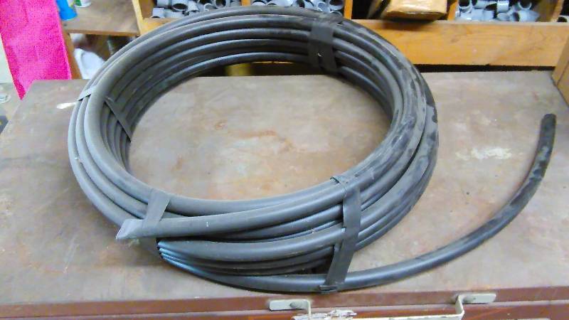 lot 36 image: Poly Pipe � Inch interior diameter, approx. 100� ft. roll