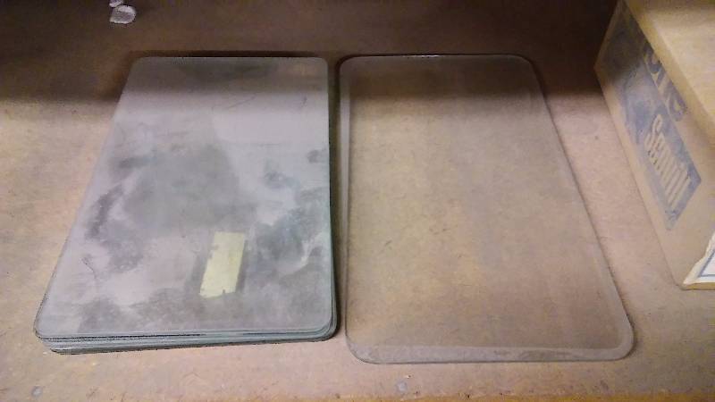 lot 215 image: Exterior Quartz Light Fixtures Lenses (9) Eight are 8 X 13.5 inches and One is 8.5 inches X 15.25 inches