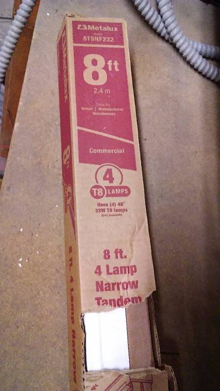 lot 220 image: Metalux 8 ft. Four lamp Narrow Tandem Strip Light