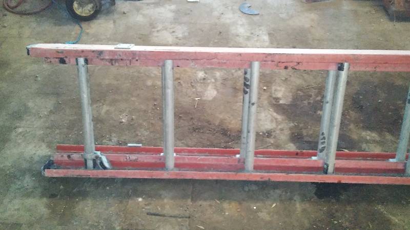 lot 567 image: 24 Ft. Extension Ladder, Fiberglass Frame with Aluminum Rungs
