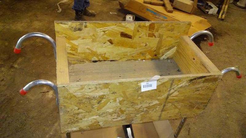 lot 600 image: Work Box with hooks and hangers, 2 ft. x 9.5 x 12